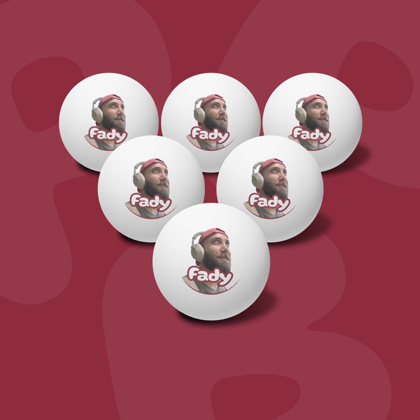 Set of six personalized ping pong balls with Fady's face and name on them
